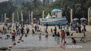 Puluhan Ribu Orang Nikmati Masa Libur di Kawasan Ancol Pada Sabtu
