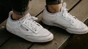 White Shoes Starting To Turn Yellow? Here's How To Clean It