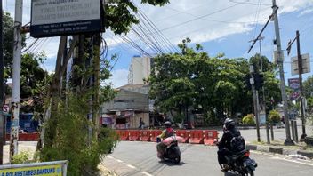 La police enquête sur la cause d’un chauffeur mort avec un câble de conduite à Bandung