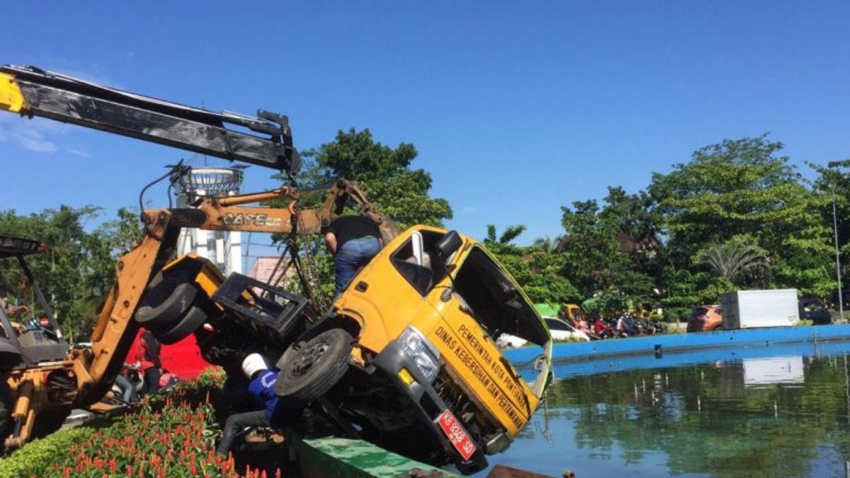 Early In The Morning, Garbage Car Enters Behind The Fountain, Driver's Head Torn