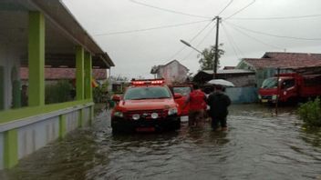 洪水はペカロンガン市の地域の数を襲った