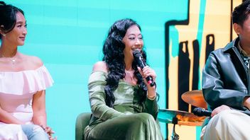 Asri Welas ferme Times Square pour une statue de la liberté