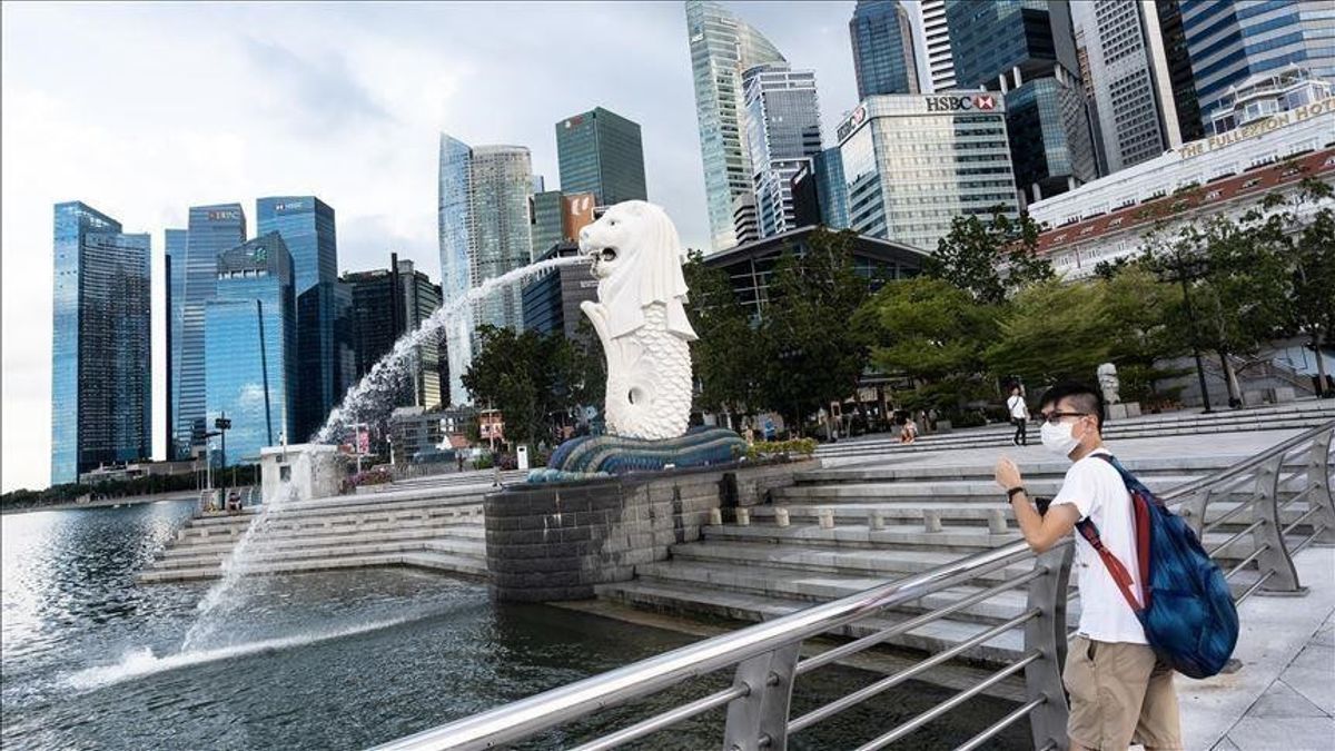 Rakyat Singapura Wajib Pakai Masker Imbas COVID-19 dalam Memori Hari Ini, 14 April 2020