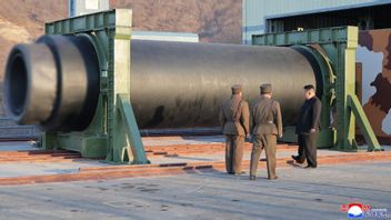 朝鲜领导人金正恩监督高能导弹发动机地面试验