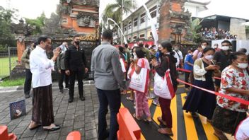 President Jokowi Distributes Basic Food To Residents Around The Tampaksiring Palace In Bali