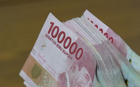 Rupiah Naik Turun di Jumat Pagi