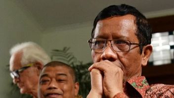 man : Le comité de réforme de la police régionale créé par Mahfud MD, un comité de réforme de la police régionale créé par Prabowo