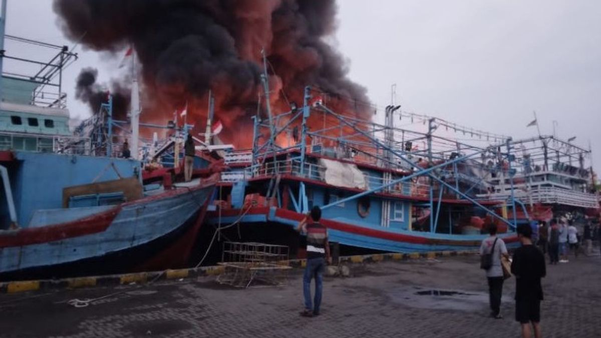 Police And Navy Evacuate Burned Ship In Tegal