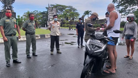 Ppkm 紧急情况： 巴厘岛仍然有布尔谁斯图博恩违反普罗克斯， 经典想去海滩的原因