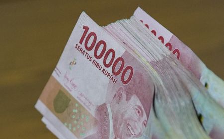 Rupiah Selasa Loyo, Ditutup Melemah 20 Poin ke Level Rp14.265 per Dolar AS