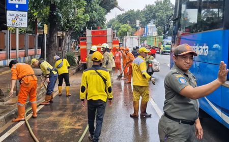 Banjir Akibat Tanggul Jebol di Kawasan Hek, Jalan Raya Bogor Sudah Surut