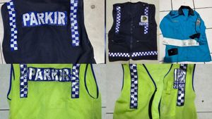 DKI雅加达Dishub背心穿着停车服务员因Pungli而被警方逮捕