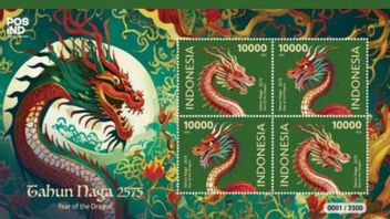 Bienvenue au Nouvel An lunaire avec la collection du timbre du bois Naga 2575 du poste indonésien
