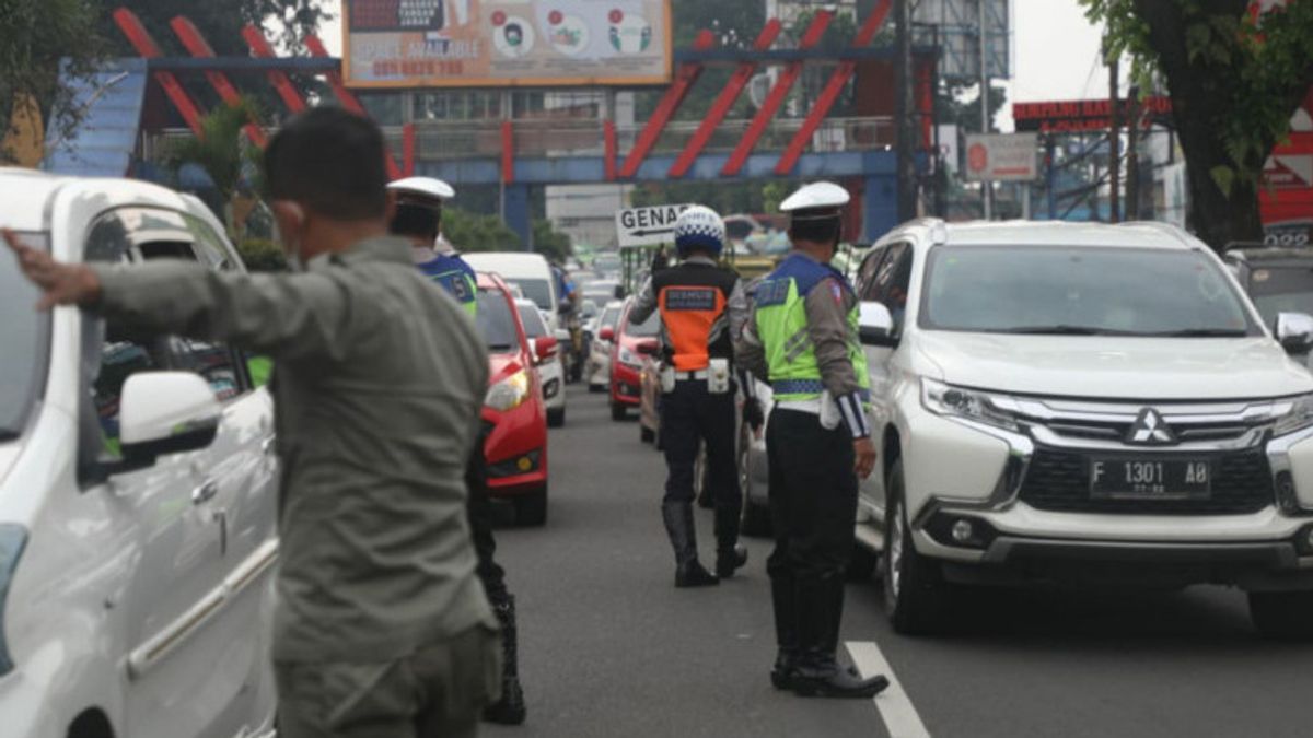 La Ville De Bogor étend Les Véhicules à Moteur Impairs-pairs