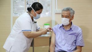 Terima Suntikan Pfizer-BioNTech, PM Singapura: Kami Siapkan Banyak Vaksin, Bahkan untuk yang Bukan Warga Negara
