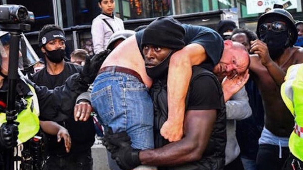 The Story Behind The Viral Black Photos Save The White Man