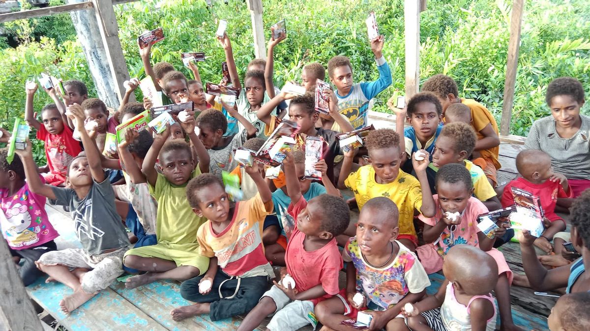 Portrait Of The Happiness Of Papuan Children Enjoying Milk And Eggs For Nutrition Improvement