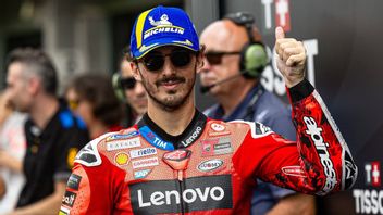 Francesco Bagnaia Raises Hands To Chase Marc Marquez