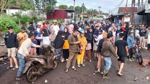غرب سومطرة - 13 شخصا لقوا حتفهم بسبب فيضان لاهر جينود في غرب سومطرة ، 4 ما زالوا مفقودين