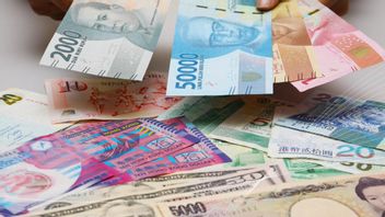 Hit By Two Sentiments, The Rupiah Weakened Slightly Wednesday Morning To Rp15,648 Per US Dollar