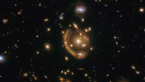 Cincin Einstein Berjarak 9 Miliar Tahun Cahaya Tertangkap oleh Teleskop Hubble, Peneliti Hitung Umurnya