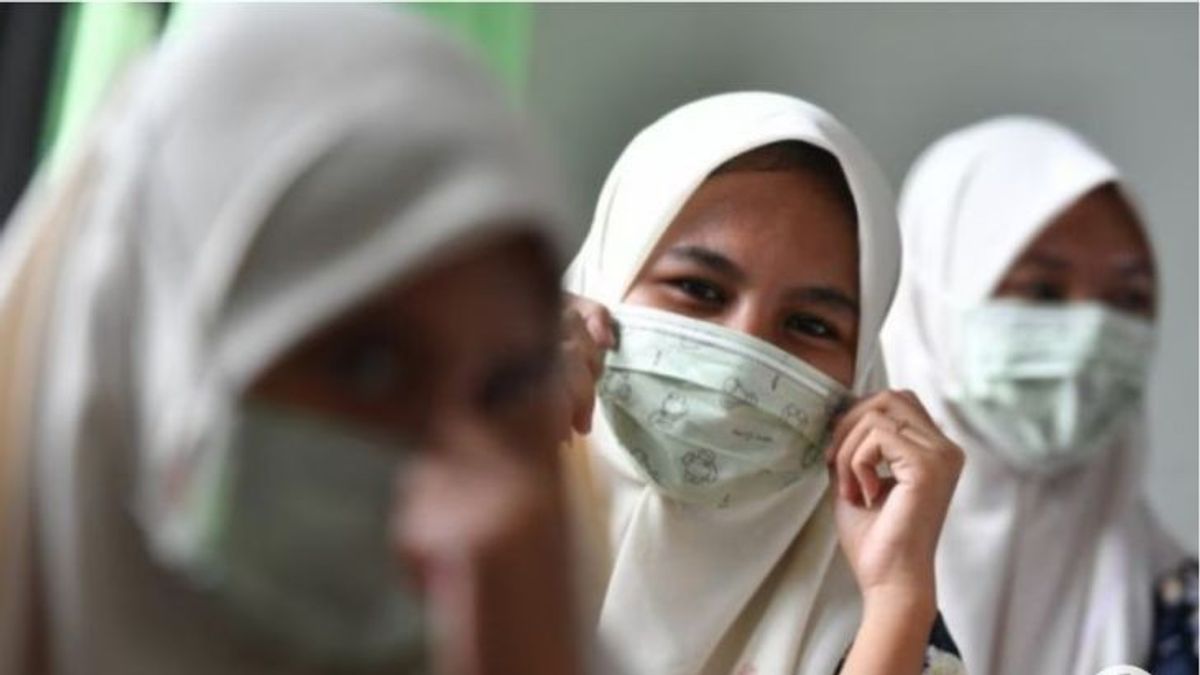Jokowi Izinkan Tidak Memakai Masker, Epidemiolog: Masker Cara Paling Efektif Mencegah Penularan COVID-19