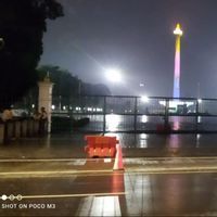 Diguyur Hujan dan Tak Ada Kembang Api, Kawasan Monas Sepi di Malam Tahun Baru 2026