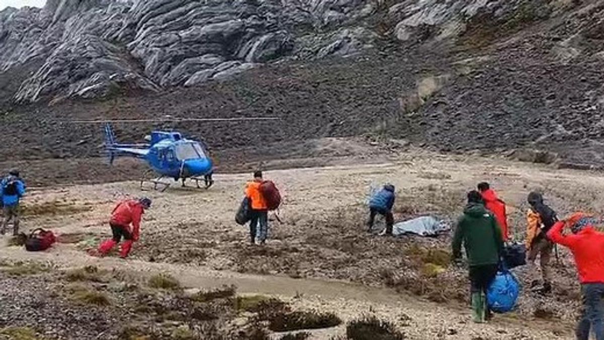 两名登山者在卡特恩茨山顶,面对天气和极端路径的年表