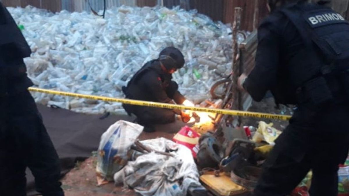 格加纳团队保护在占碑垃圾铁堆中发现的手榴弹