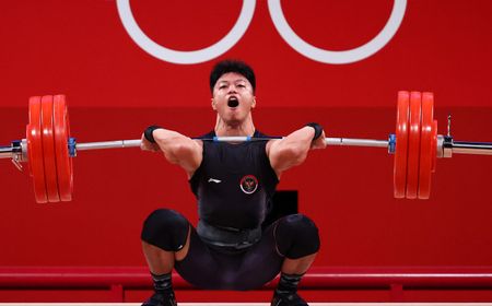 Keren! Lifter Rahmat Erwin Abdullah Catat Angkatan Terbaik di Grup B Kelas 73 Kg