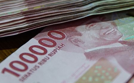 Rupiah Melempem di Akhir Pekan, Ditutup Melemah 0,15 Persen ke Rp14.100 per Dolar AS