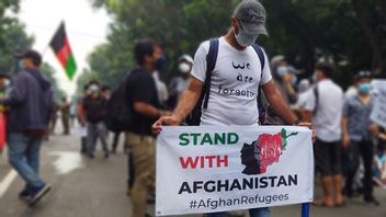 阿里，雅加达的阿富汗难民承认压力和自杀念头