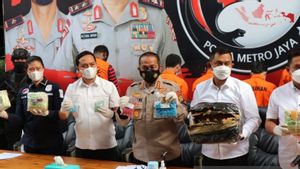 Polisi Tangkap WN Nigeria Penerima Paket 5.385 Butir Ekstasi yang Dikirim via Pos dari Jerman