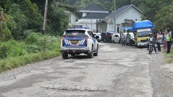 Entrée IJD, la route régionale de Payakumbuh-Sitangkai a été traitée 2,9 km