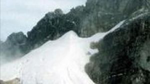 Lorenz National Park Center Monitors Snow Conditions At The Peak Of Cartenz