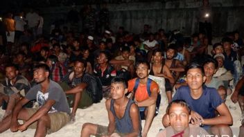 Husson Muktar, WN Bangladesh qui est devenu agent de trafic de peuples Rohingya à Aceh pour un profit de 3,3 milliards de roupies