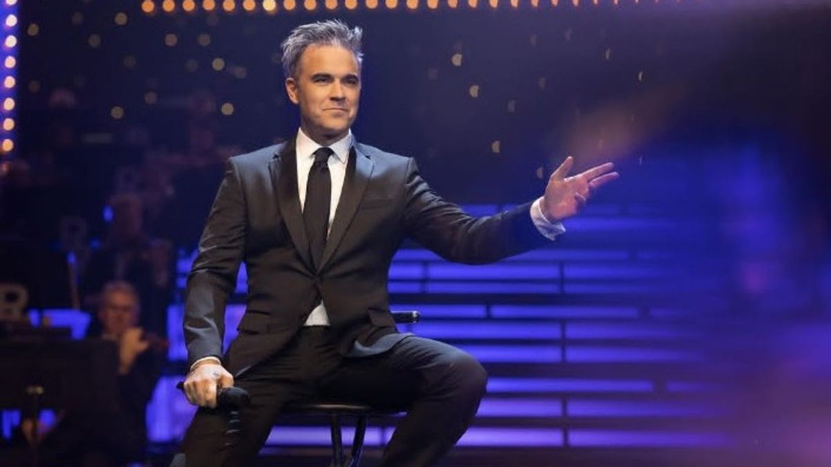 Dukungan Robbie Williams kepada Oasis Terkait Kontroversi <i>Dynamic Pricing</i>