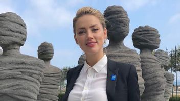 Tanpa Hamil, Amber Heard Umumkan Kelahiran Anak Pertama