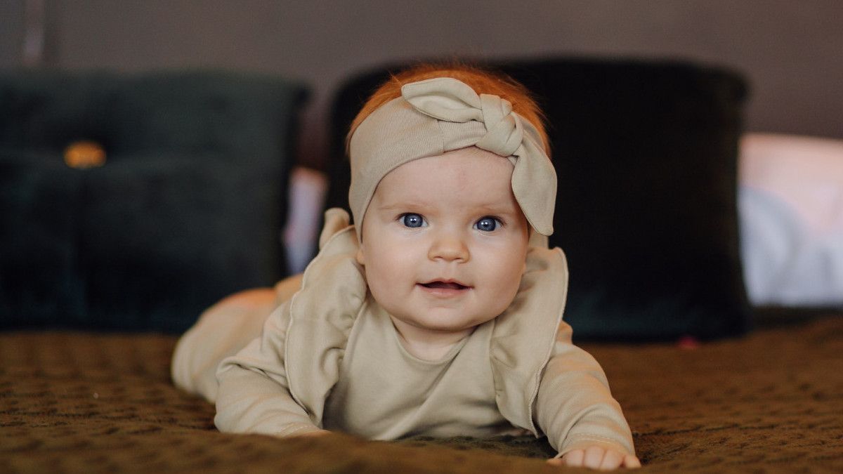 Knowing What Tummy Time Is, An Act That Accelerates Growing Baby Flower