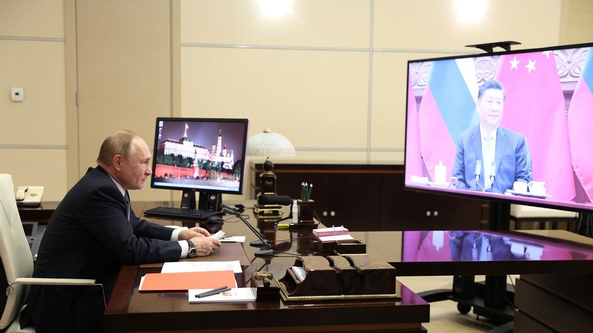 عقد اجتماع افتراضي، الرئيس بوتين والرئيس شي جين بينغ ينتقدان تحالف أوكوس وتحالف رباعي عسكري