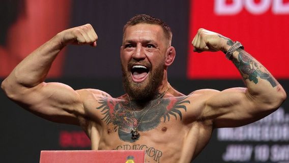 Wanita Ini Bikin Tato Nama Conor McGregor Dekat Payudaranya Gunakan <i>Font</i> Comic Sans, Netizen: Sangat Jelek 