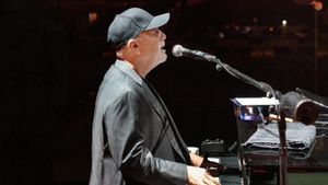 比利·乔尔(Billy Joel)和克里斯蒂·布林克利(Christie Brinkley)带着歌曲《Uptown Girl》失眠