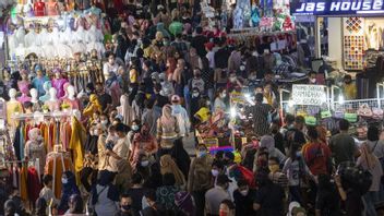 2022年开斋节前丹那阿邦市场的喧嚣是纺织业复苏的动力