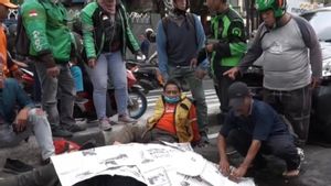 身份不明的摩托车手被发现死亡,Jalan RS Soekanto Duren Sawit的破碎者负责人