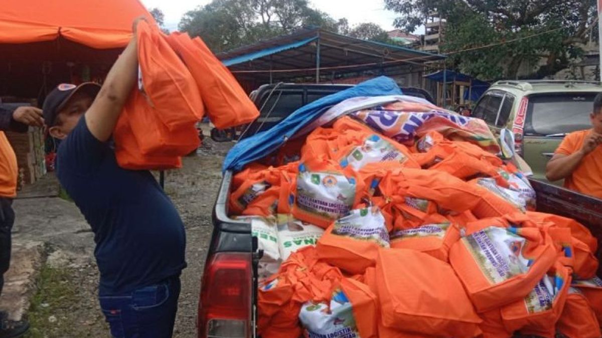 Le gouvernement provincial de Riau distribue une aide logistique de phase 2 pour les victimes des inondations de Rohul