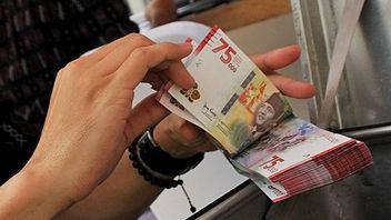 بنك إندونيسيا يشجع الناس على استخدام IDR 75.000 نقدا لإعطاء بدل عطلة
