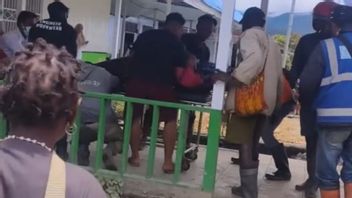 مقياس الطريق في إنتان جايا بابوا ، قتل العمال برصاص KKB