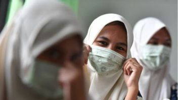 Jokowi Izinkan Tidak Memakai Masker, Epidemiolog: Masker Cara Paling Efektif Mencegah Penularan COVID-19