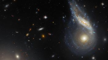 ハッブル望遠鏡が衝突する銀河の肖像画を共有する