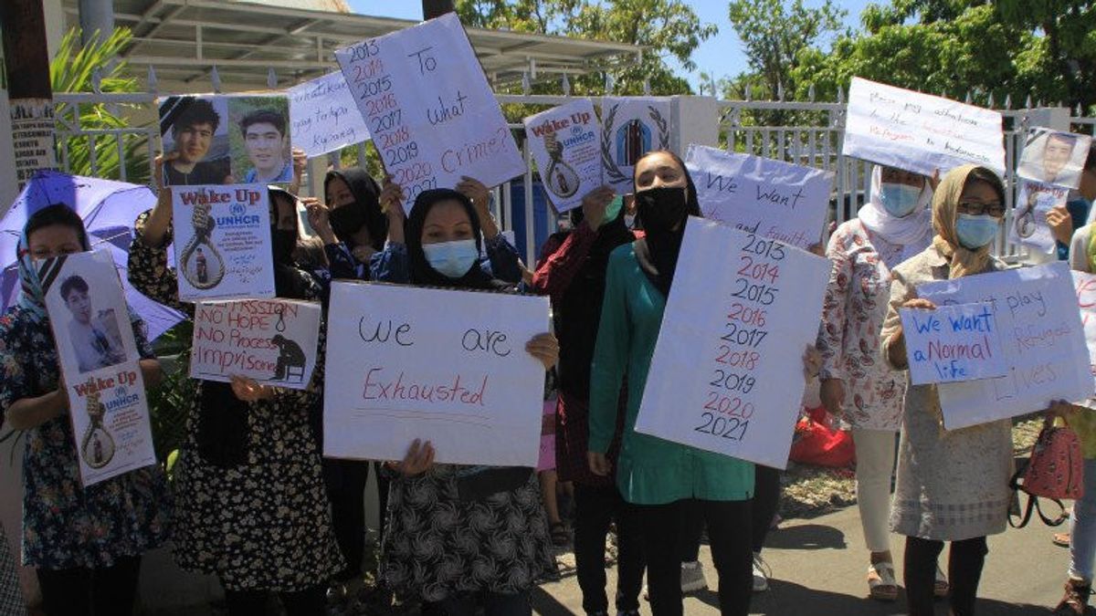8 年的 Php， 阿富汗移民在库邦举行演示 '我们筋疲力尽了' 